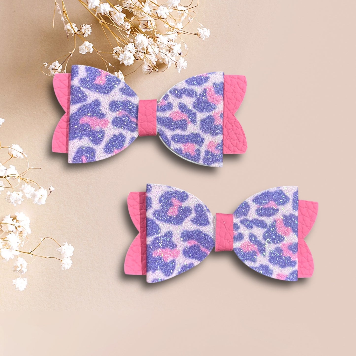 Pink leopard bow